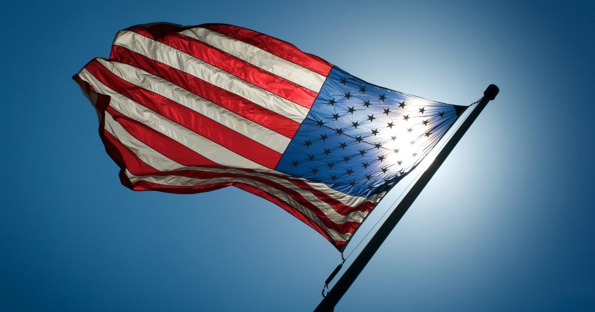 An American flag is pictured in the stock image above.