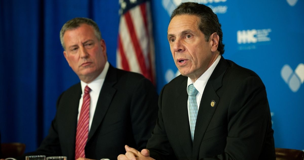 Mayor Bill de Blasio of New York City and Gov. Andrew Cuomo of New York speak at a press conference on Oct. 23, 2014, in New York City.
