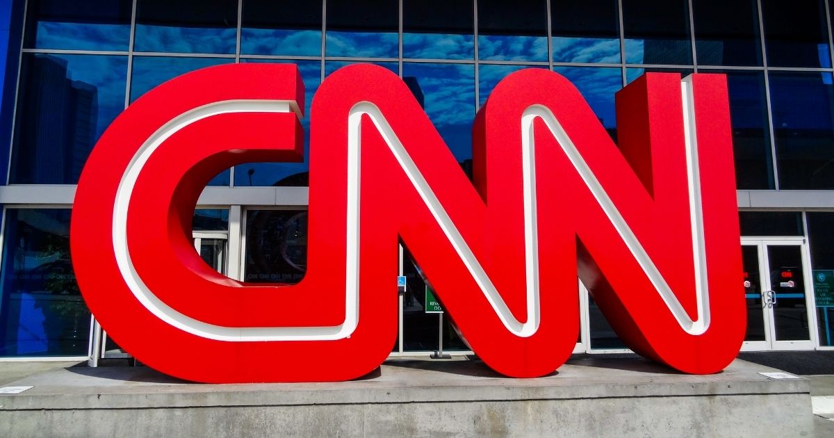 The CNN logo stands outside the company’s headquarters in Atlanta.