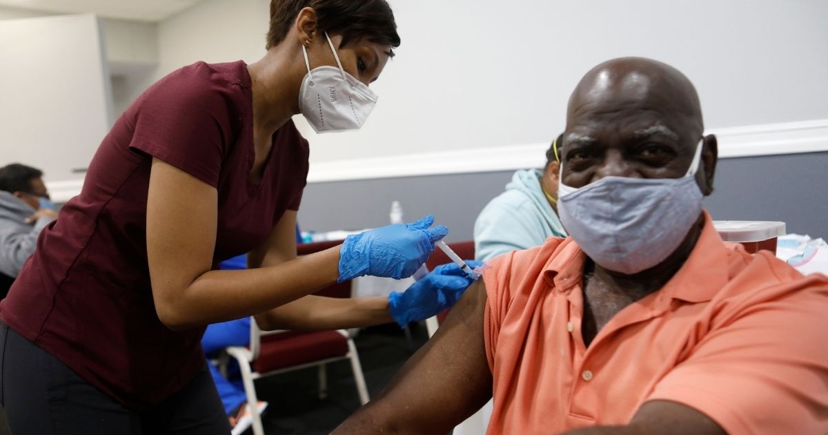 A man receives the Moderna COVID-19 vaccine in Tampa, Florida, on Feb. 13.