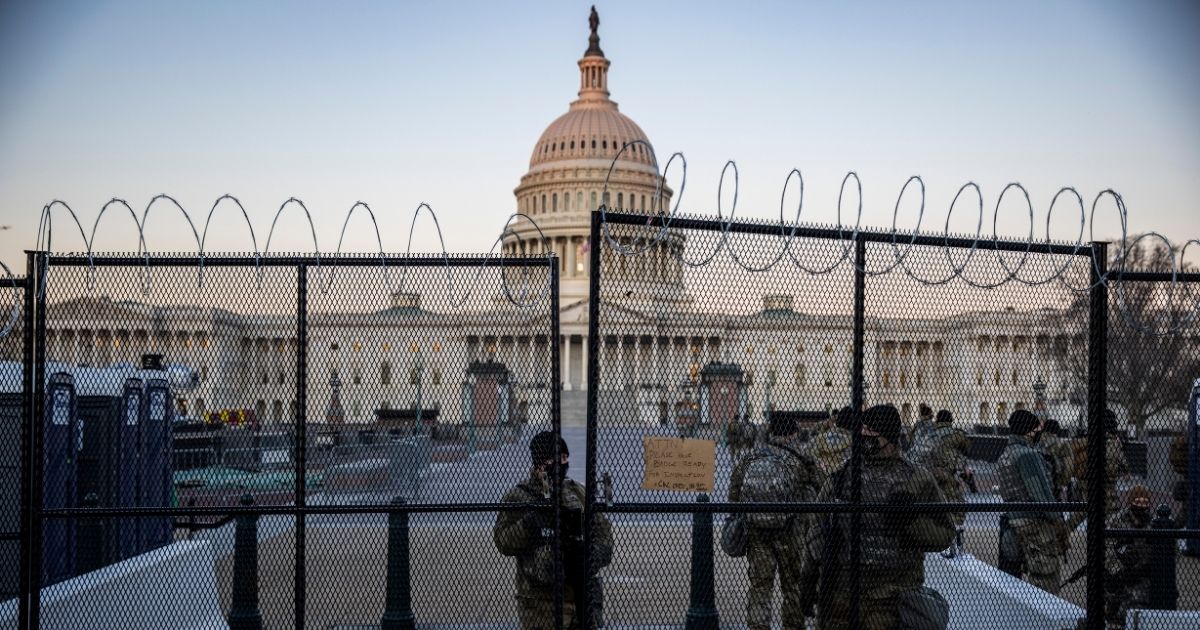 The U.S. Capitol is seen as National Guard troops secure the the grounds on Feb. 8, 2021, in Washington, D.C.