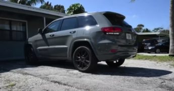 Sandy Martinez's car in the driveway of her house. She is being charged large fines for parking the incorrectly on her property.