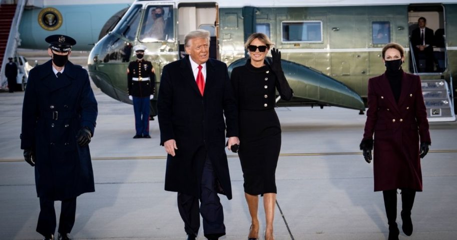 Former President Donald Trump and First Lady Melania Trump acknowledge waiting supporters at Joint Base Andrews before boarding Air Force One for his last time as President on Jan. 20, 2021 in Joint Base Andrews, Maryland.