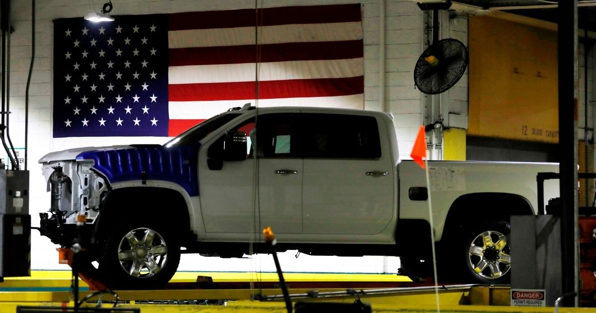A General Motors Co. pickup truck is pictured on June 12, 2019, on an assembly line in a plant in Flint, Michigan.