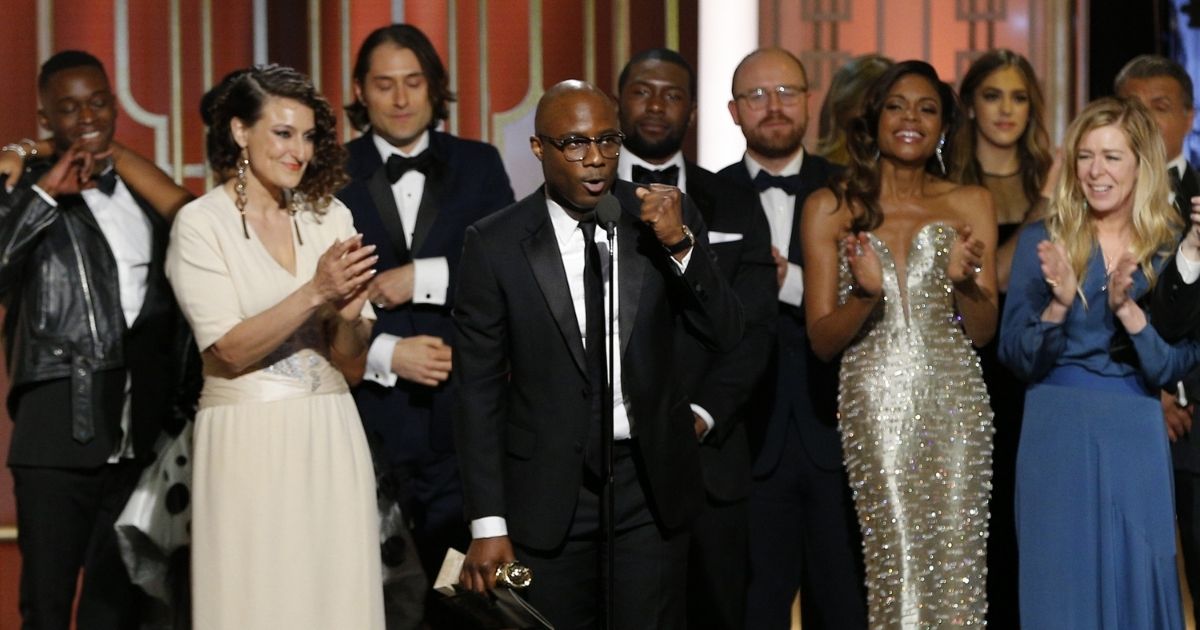 In this handout photo provided by NBCUniversal, actor Ashton Sanders, producer Adele Romanski, producer Jeremy Kleiner, director Barry Jenkins, actor Trevante Rhodes, cinematographer James Laxton, actress Naomie Harris and producer Dede Gardner of "Moonlight" accept the award for Best Motion Picture - Drama for "Moonlight" onstage during the 74th Annual Golden Globe Awards at The Beverly Hilton Hotel on Jan. 8, 2017, in Beverly Hills, California.