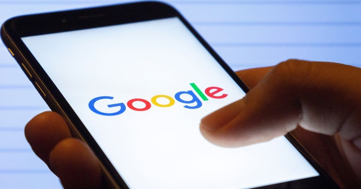 The Google logo is pictured on a phone screen in the stock image above.