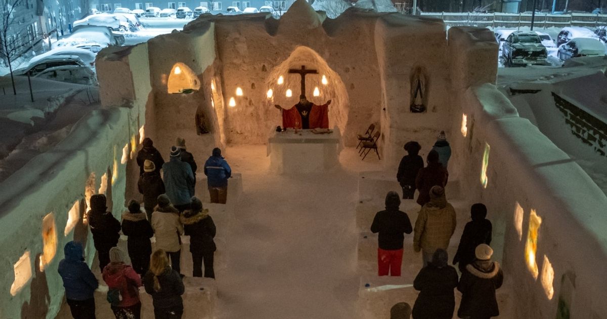 Students celebrate mass in the ice chapel on the campus of Michigan Technological University.