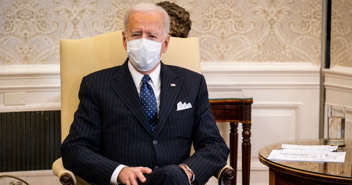 President Joe Biden sits in the Oval Office at the White House in Washington, D.C., on Tuesday.