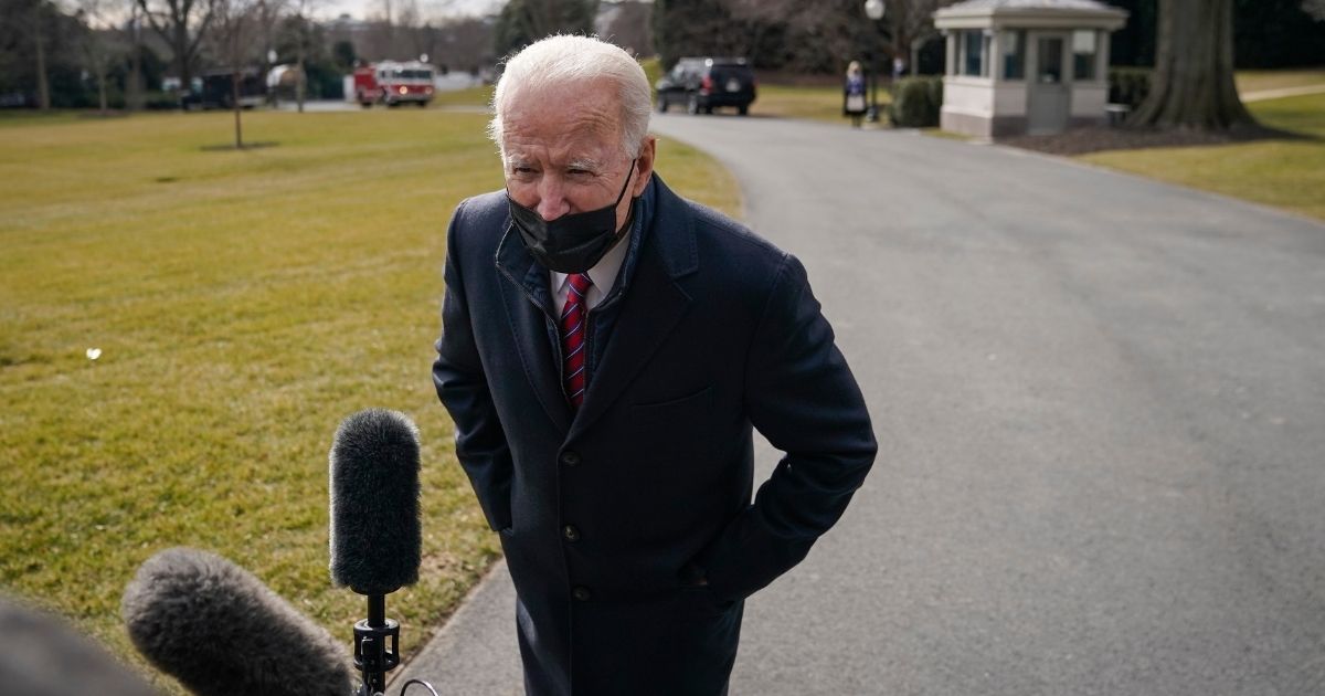 President Joe Biden stops to briefly speak with reporters on his way to Marine One on the South Lawn of the White House on Sunday in Washington, D.C.