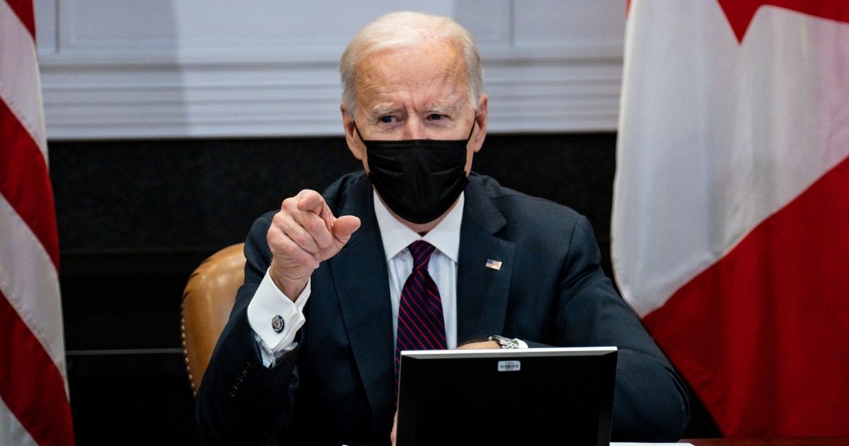 President Joe Biden participates in a virtual bilateral meeting with Prime Minister Justin Trudeau of Canada in the Roosevelt Room of the White House in Washington, D.C., on Tuesday.