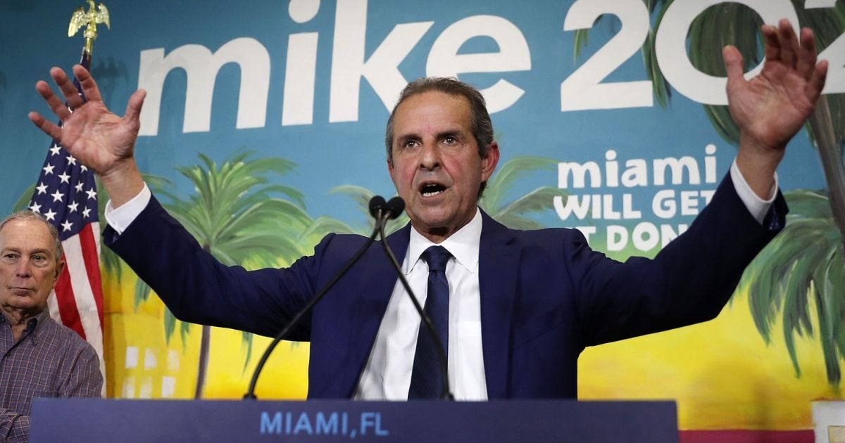 Former Miami Mayor Manny Diaz speaks as he introduces former New York City Mayor Michael Bloomberg during a stop at one of Bloomberg's presidential campaign offices in the Little Havana neighborhood on March 3, 2020, in Miami.