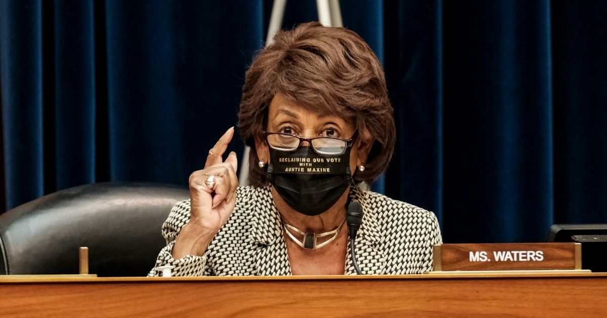 Democratic Rep. Maxine Waters of California listens to Health and Human Services Secretary Alex M. Azar at a hearing before the House Select Subcommittee on the Coronavirus Crisis on Oct. 2, 2020, in Washington, D.C.