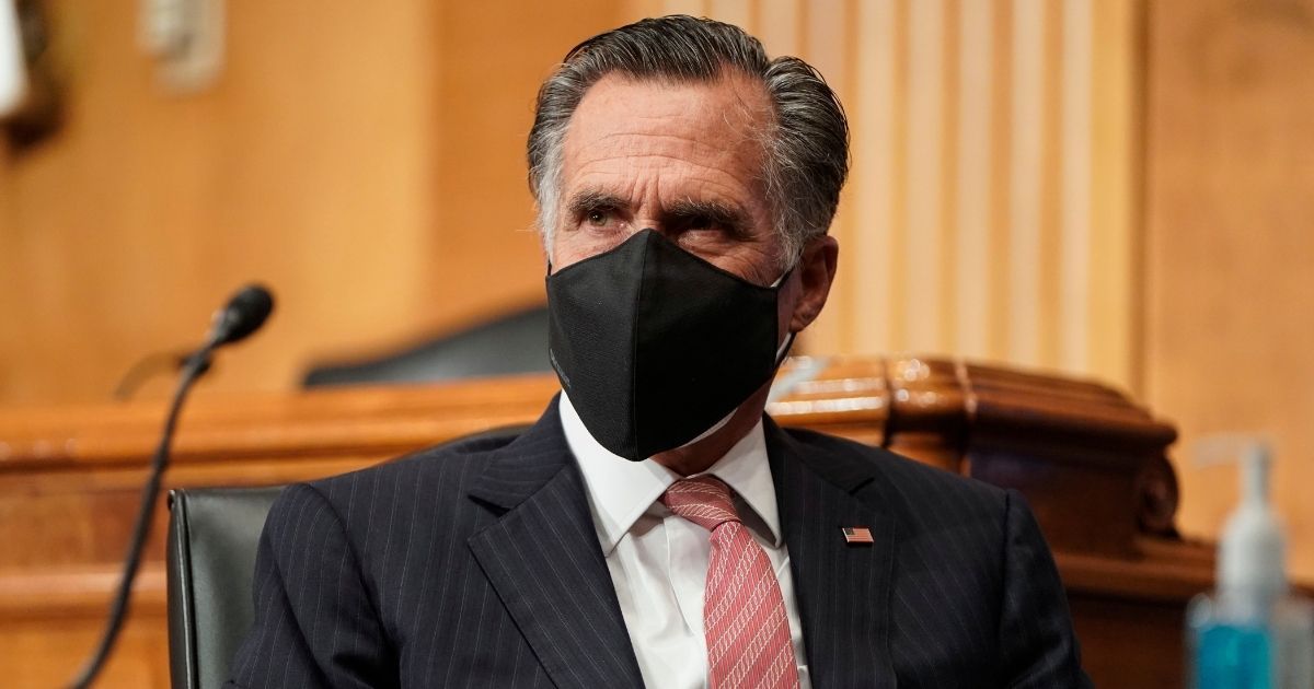 Republican Sen. Mitt Romney of Utah attends a Senate Homeland Security and Governmental Affairs confirmation hearing on Capitol Hill on Jan. 19, 2021, in Washington, D.C.
