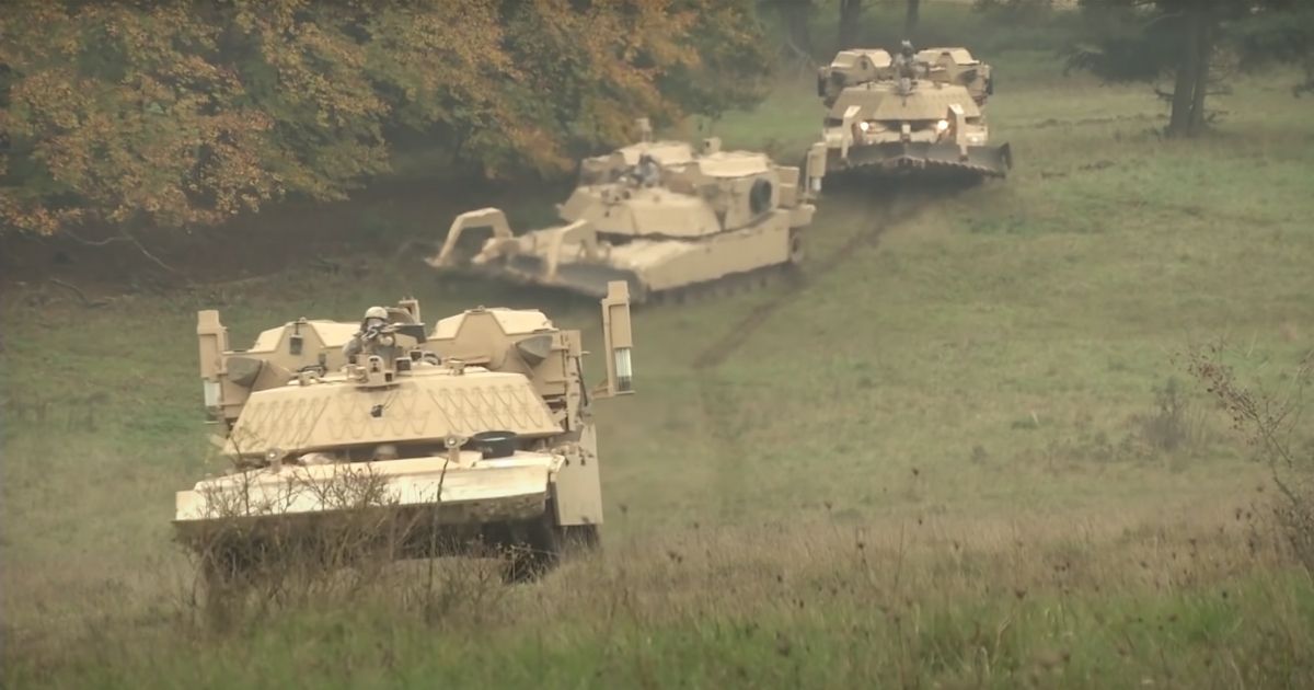 Assault Breacher Vehicles conduct a training exercise.