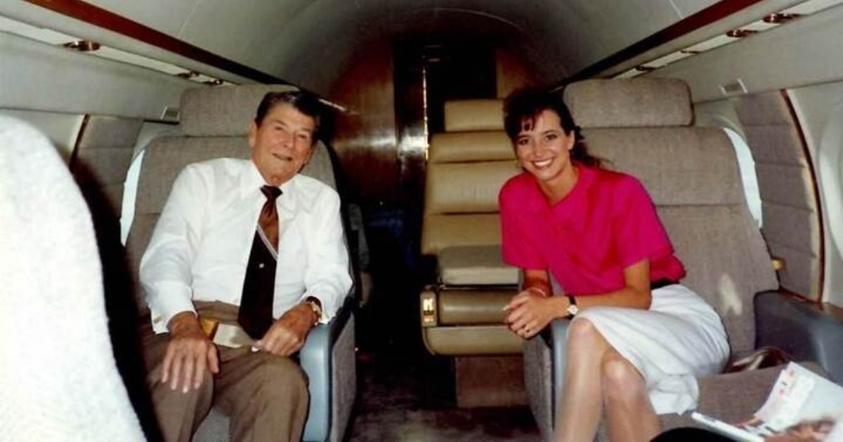 Peggy Grande with then-President Ronald Reagan on Air Force 1.