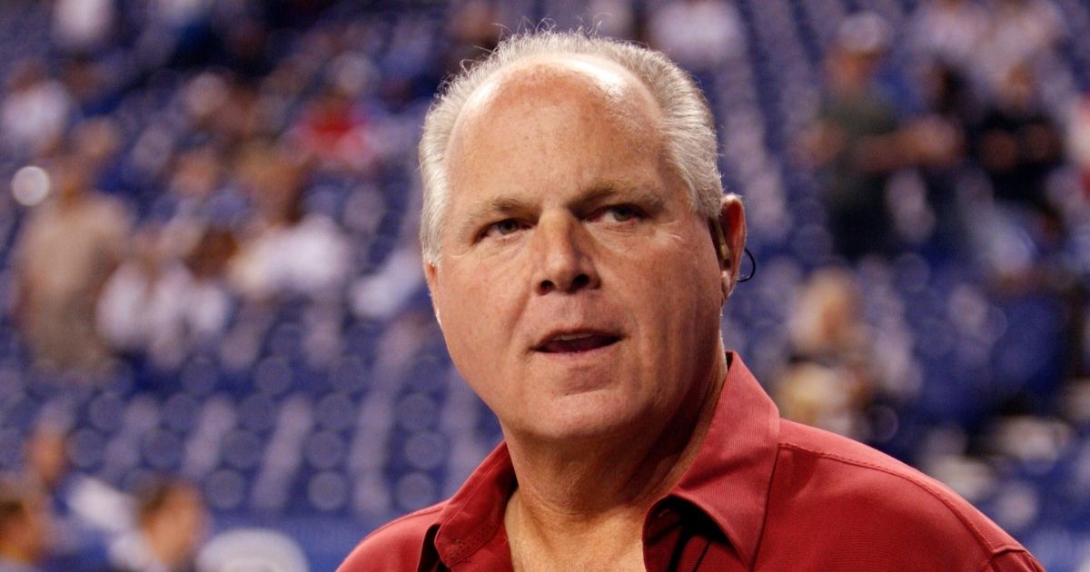 Conservative talk radio host Rush Limbaugh is seen on the sideline before the start of an NFL football game between New England Patriots and Indianapolis Colts on Nov. 15, 2009, in Indianapolis.