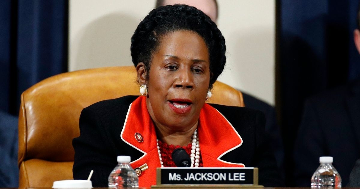 Democratic Rep. Shelia Jackson Lee of Texas votes to approve the second article of impeachment as the House Judiciary Committee holds a public hearing to vote on the two articles of impeachment against then-President Donald Trump in the Longworth House Office Building on Capitol Hill on Dec. 13, 2019, in Washington, D.C.