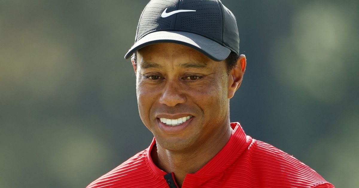 Tiger Woods reacts after finishing on the 18th green during the final round of the Masters at Augusta National Golf Club in Georgia on Nov. 15.