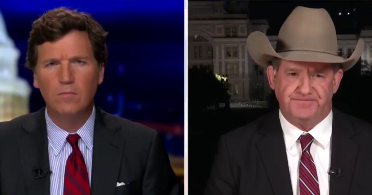 Sheriff A.J. Louderback of Jackson County, Texas, speaks with Fox News host Tucker Carlson regarding the Biden administration's immigration policies on Monday night.