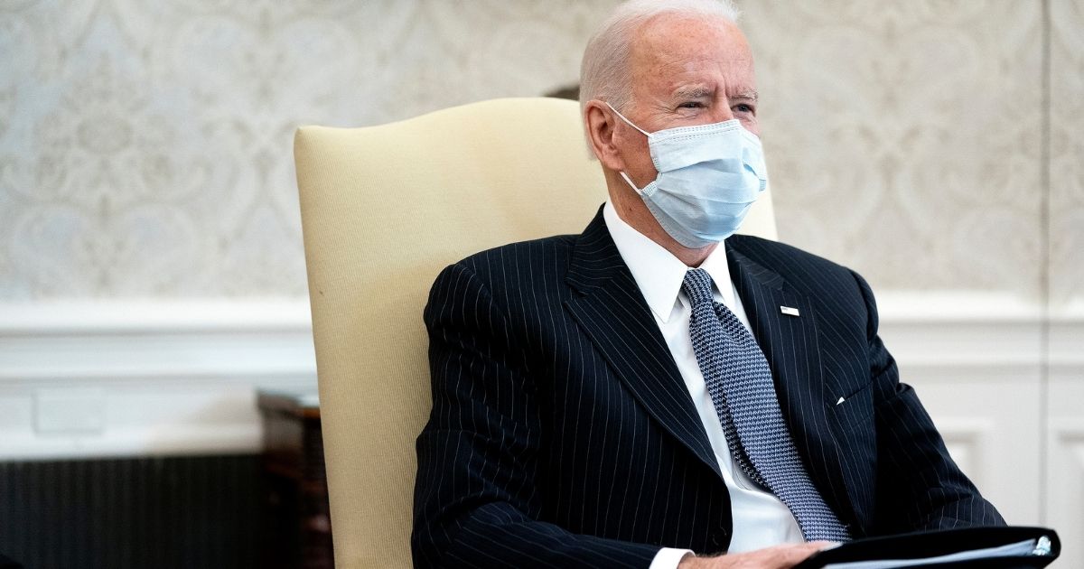 President Joe Biden, pictured meeting with Democratic senators at the White House on Feb. 3, 2021, to discuss his $1.9 trillion American Rescue Plan, is being criticized by some Asian-Americans for ignoring issues that affect them in America.