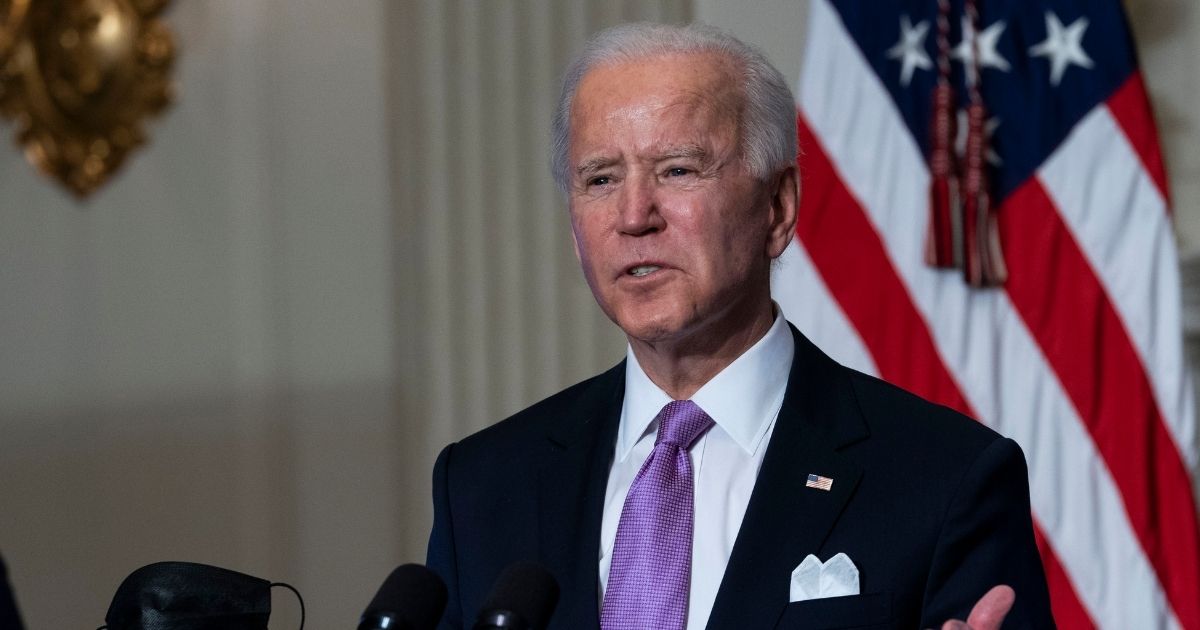 President Joe Biden, pictured in the White House last week, has pledged an "absolute wall" between his presidency and his family's business interests, but in the first days of his administration, it apparently isn't working out that way.