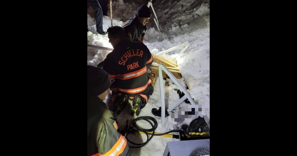 Firefighters with the Schiller Park Fire Department in Illinois rescue a woman who had been trapped under a collapsed awning for over 10 hours.