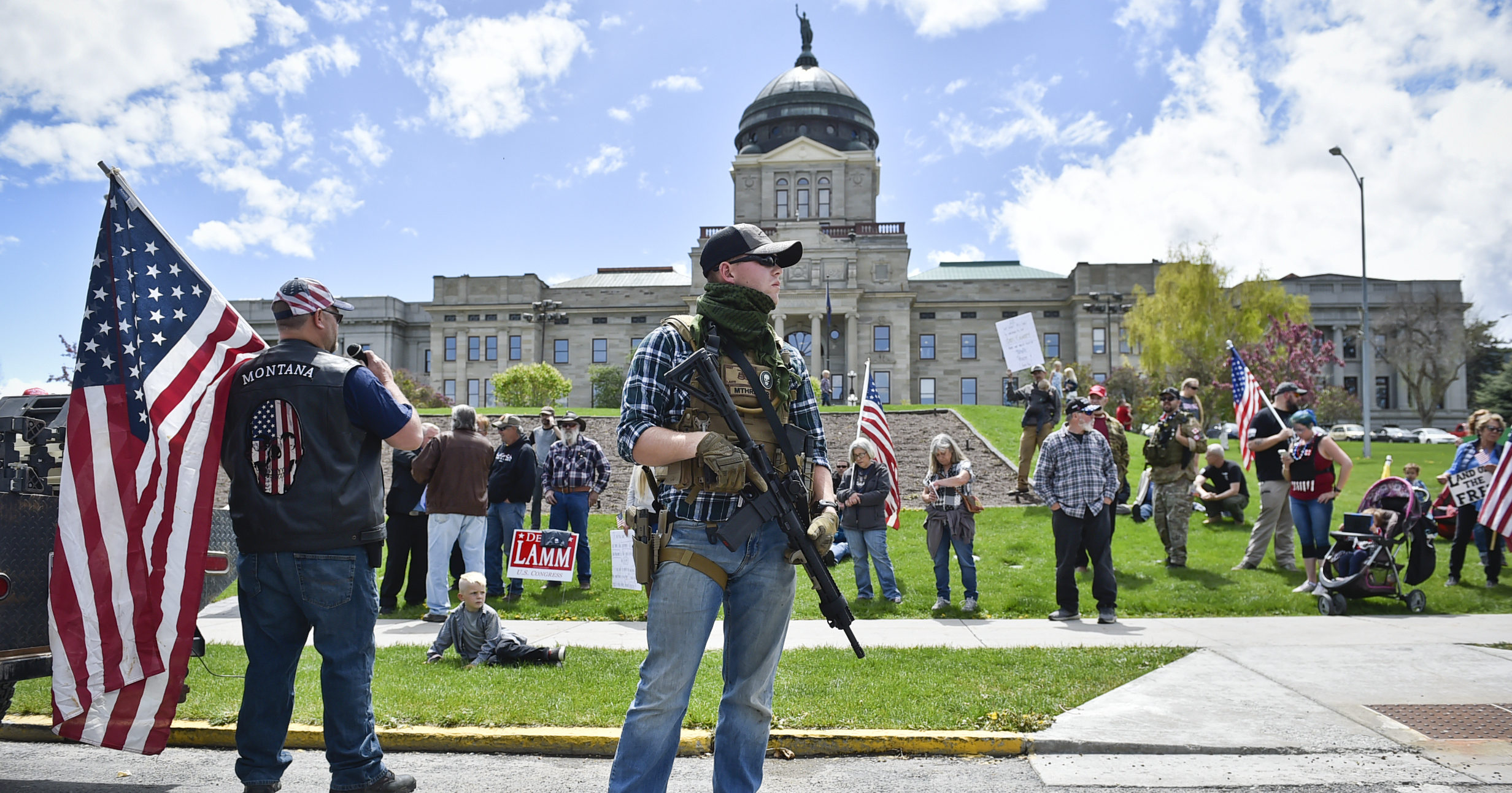 Protesters gather outside the Montana State Capitol in Helena, Montana, on May 20, 2020.