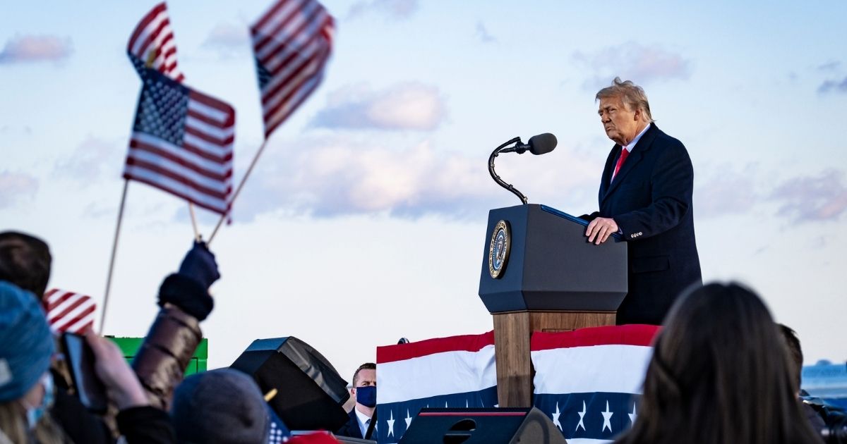 President Donald Trump speaks to supporters before boarding Air Force One on Jan. 20, 2021, at Joint Base Andrews, Maryland.