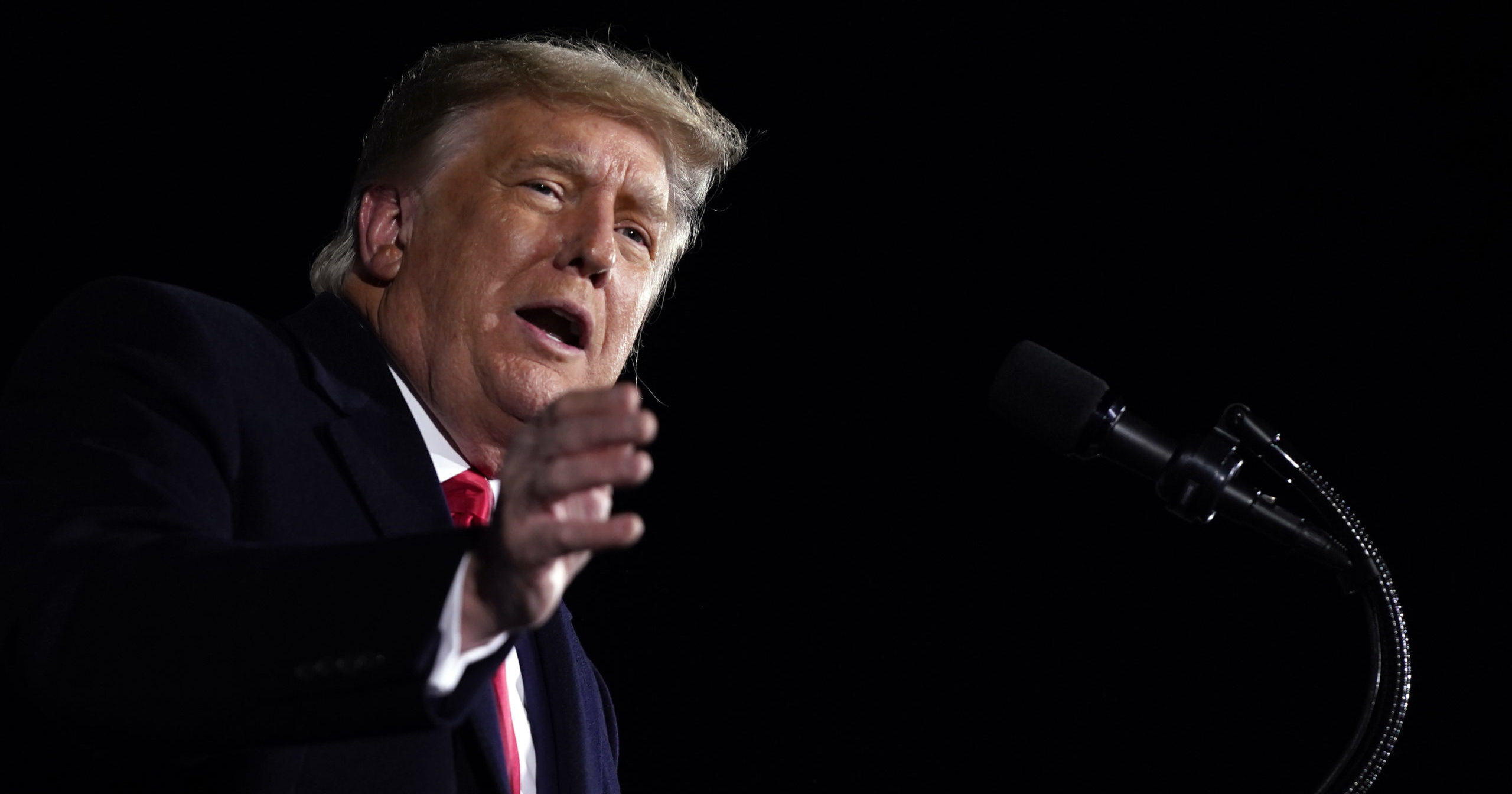 President Donald Trump speaks at a campaign rally for Sens. Kelly Loeffler and David Perdue at Dalton Regional Airport in Dalton, Georgia, on Jan. 4, 2021.