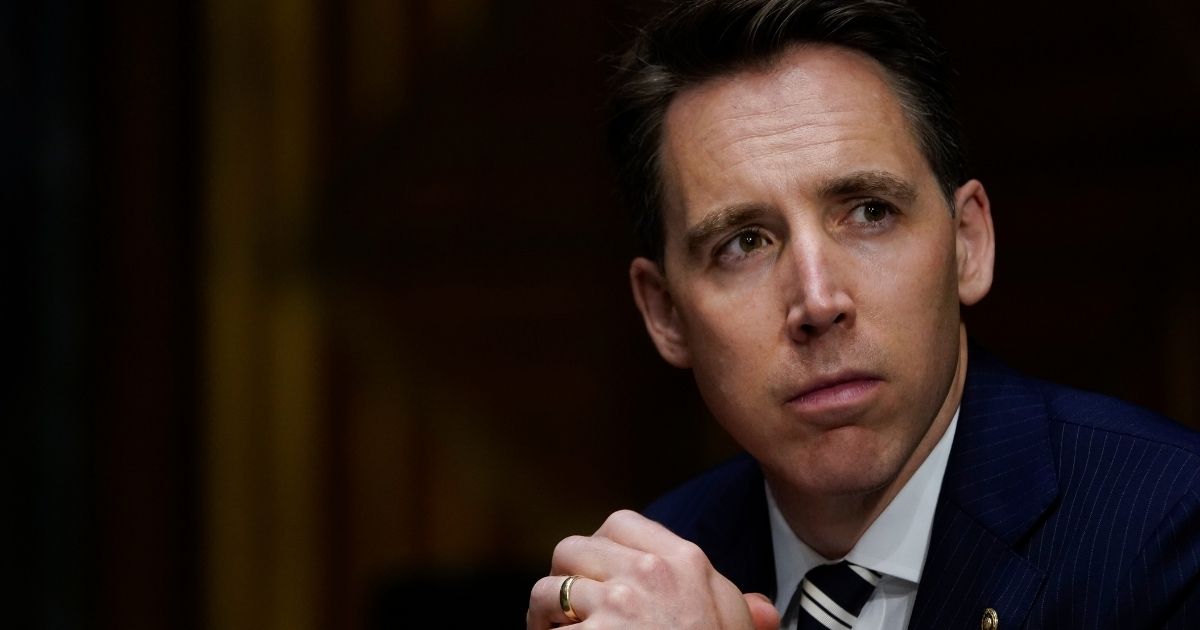 Sen. Josh Hawley of Missouri listens during a Senate Armed Services Committee hearing on Capitol Hill on July 28, 2020, in Washington, D.C.