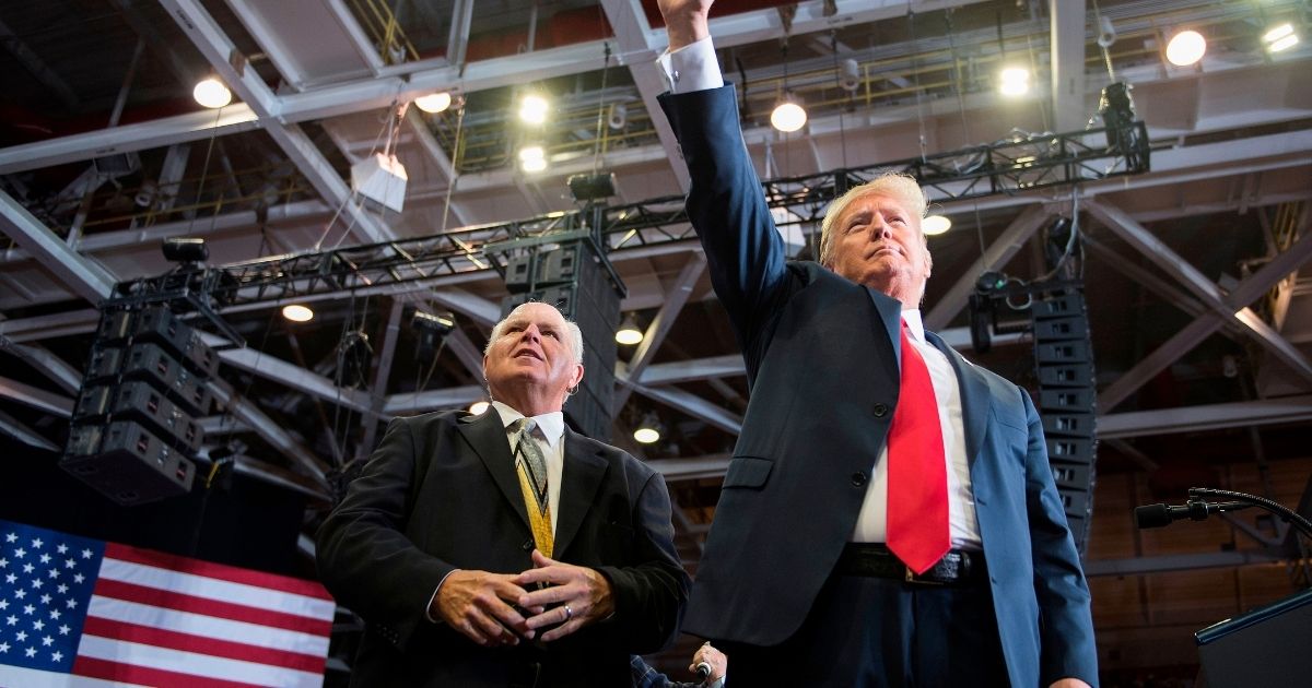 President Donald Trump and radio talk show host Rush Limbaugh arrive at a Make America Great Again rally in Cape Girardeau, Missouri, on Nov. 5, 2018.