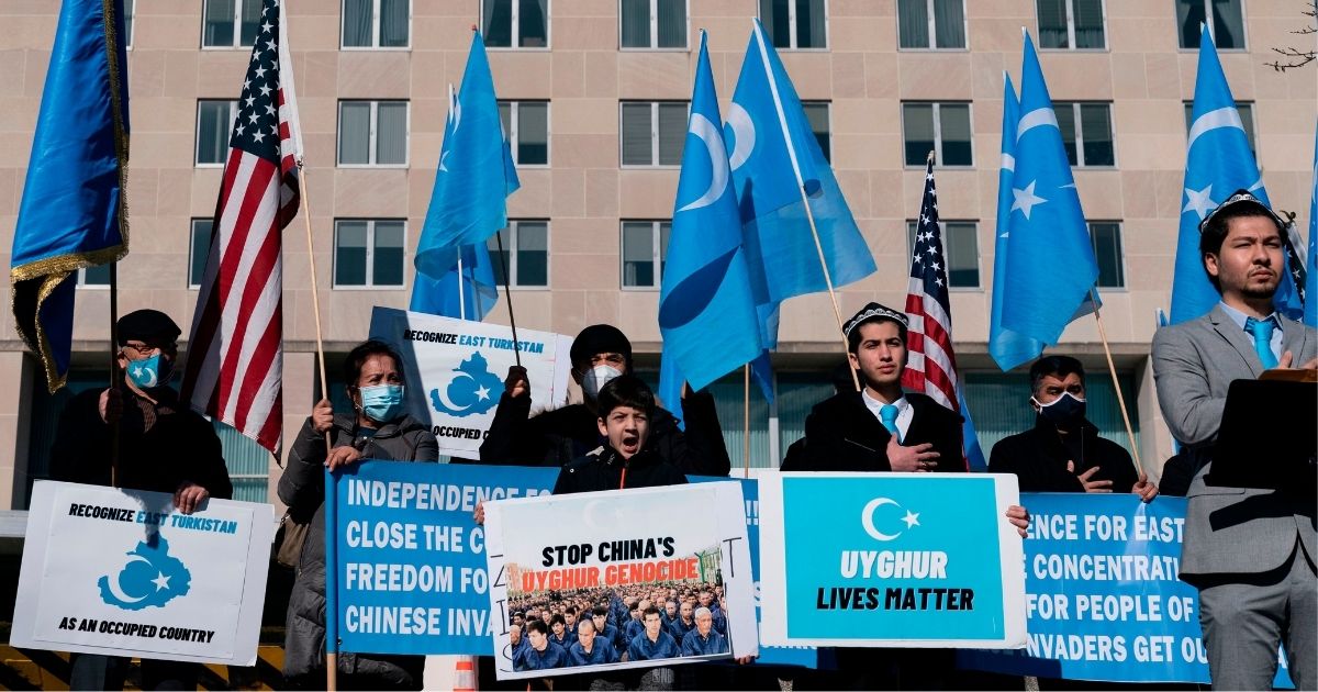 Uighurs of the East Turkistan National Awakening Movement hold a rally outside the US State Department calling on President Joe Biden to increase pressure on the Chinese Communist Party on Feb. 6, 2021, in Washington, D.C.