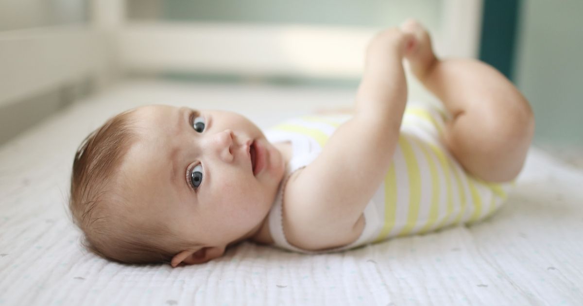 This stock photo portrays a baby at five months old. Outspoken critic of critical race theory Christopher F. Rufo revealed a series of educational guidances provided by the Arizona Department of Education, including a page explaining that babies begin to racially discriminate as early as three months old and "remain strongly biased in favor of whiteness" by age 4.