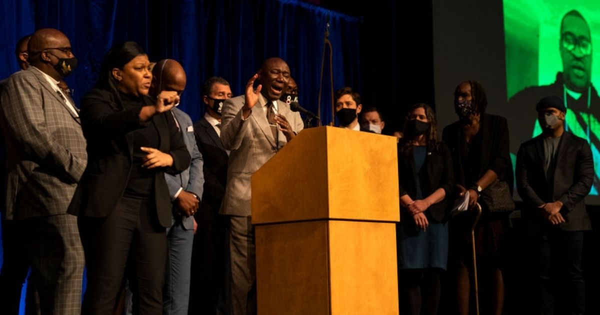 Attorney Ben Crump, center, representing the family of George Floyd, is joined by members of the family and members of the Minneapolis city government as he speaks during a news conference at the Minneapolis Convention Center in Minneapolis on Friday.