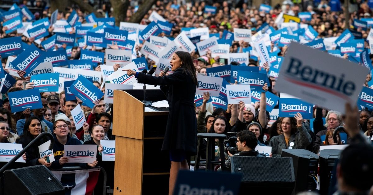 Democratic Rep. Alexandria Ocasio-Cortez of New York addresses supporters during a campaign rally for former Democratic presidential candidate Sen. Bernie Sanders of Vermont on March 8, 2020, in Ann Arbor, Michigan.