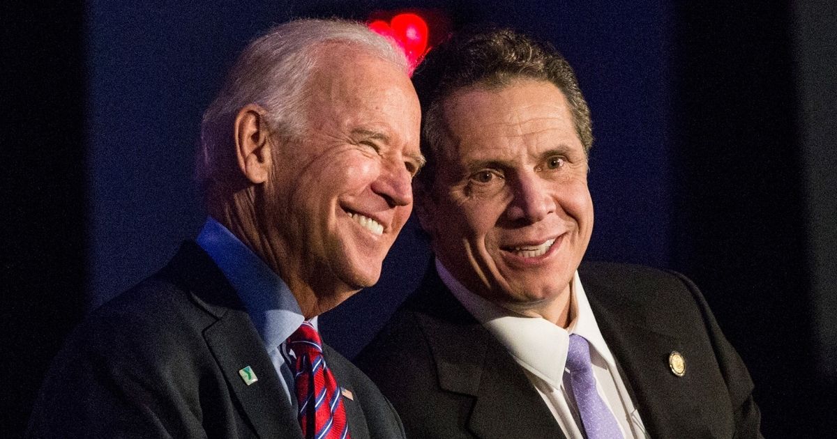 Then-Vice President Joe Biden and New York Gov. Andrew Cuomo share a laugh during an event in New York City on Jan. 29, 2016.