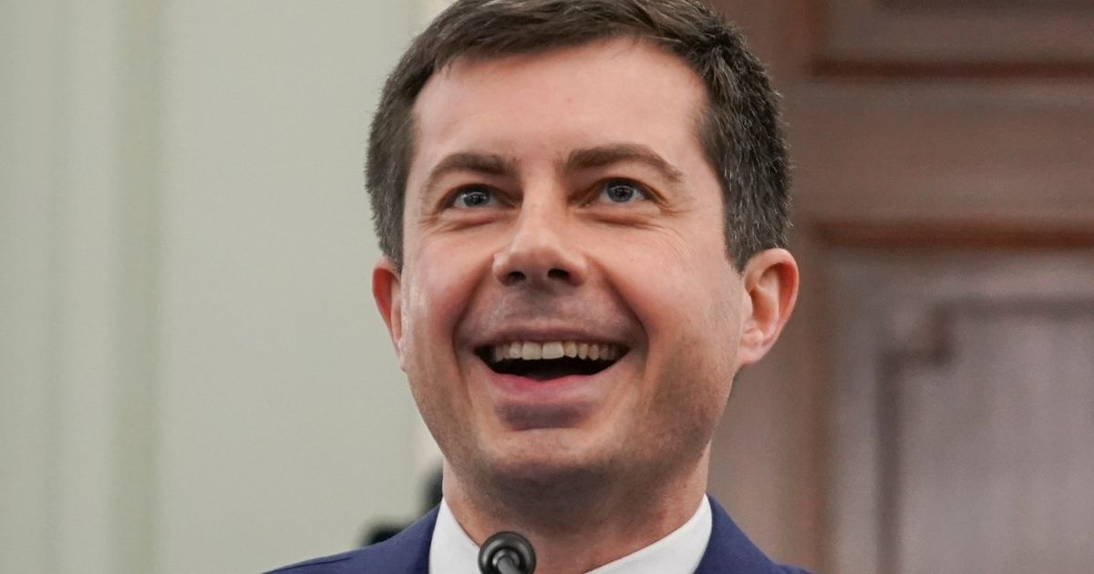 Pete Buttigieg smiles during a Senate Commerce, Science and Transportation Committee confirmation hearing on his nomination to be secretary of transportation on Jan. 21 in Washington.