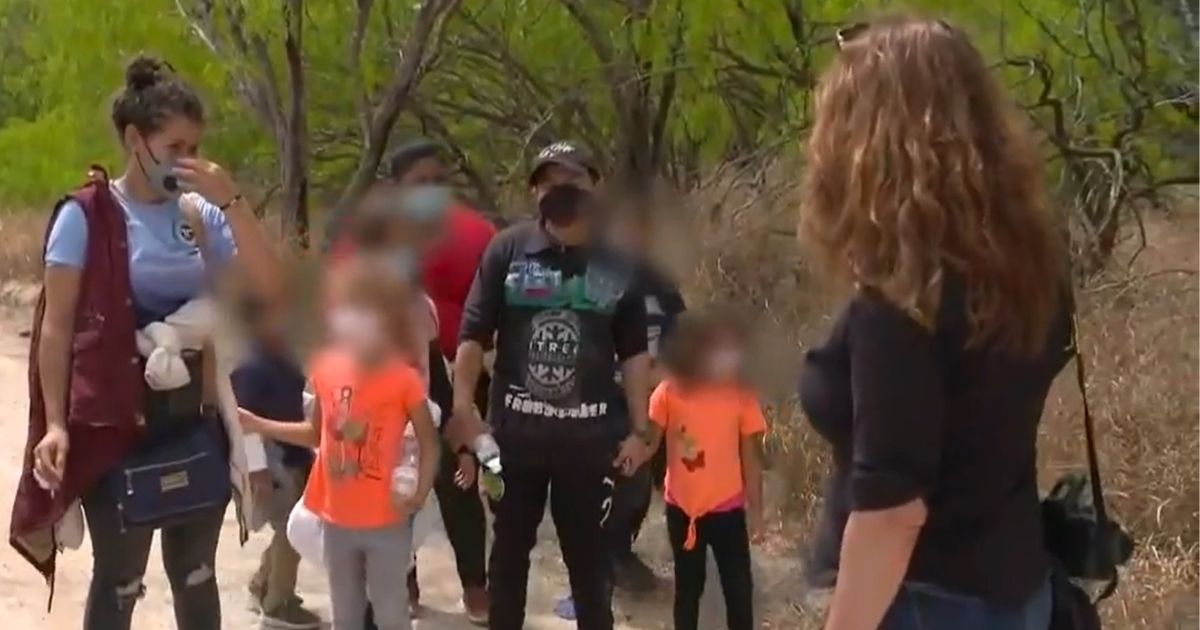 Independent journalist Sara Carter talks with illegal immigrants near the border in McAllen, Texas.