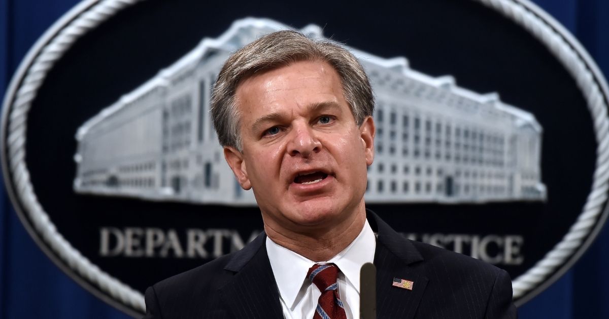 FBI Director Christopher Wray announces significant law enforcement actions related to the illegal sale of drugs and other illicit goods and services on the darknet during a news conference at the Department of Justice on Sept. 22, 2020, in Washington, D.C.