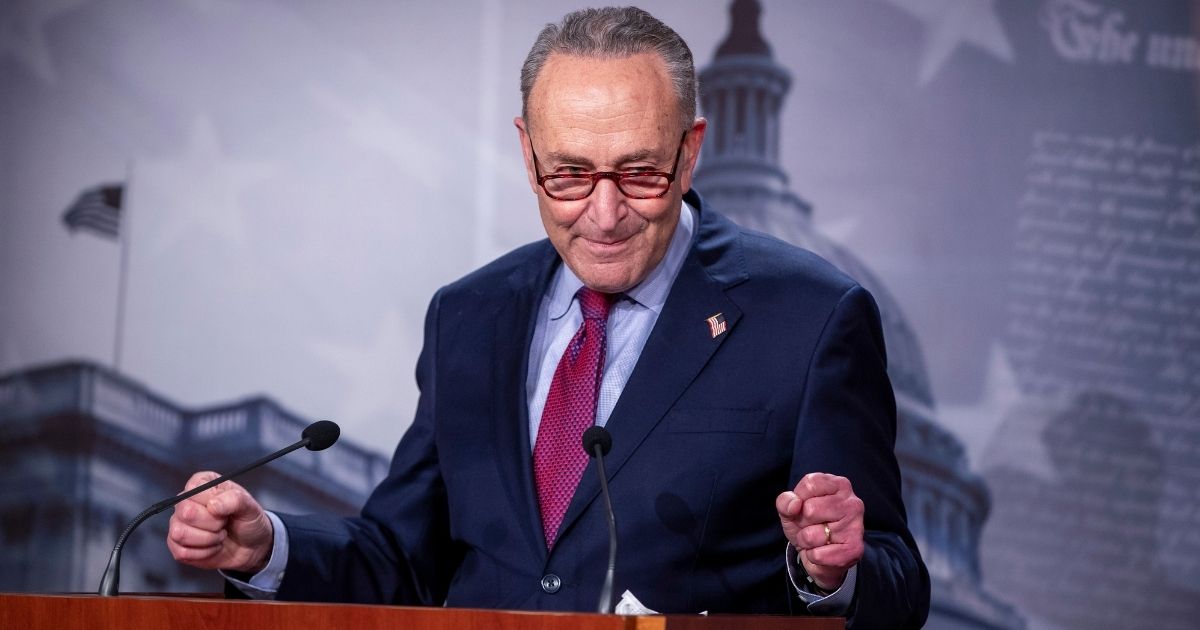 Senate Majority Leader Chuck Schumer of New York talks about the Democrats' COVID-19 relief package during a news conference at the U.S. Capitol in Washington on Saturday.