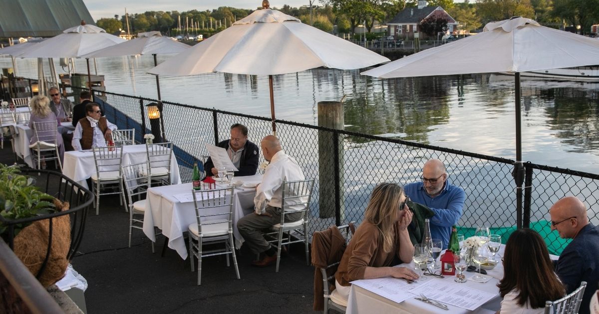 Patrons sit at L'escale restaurant on May 20, 2020, in Greenwich, Connecticut.