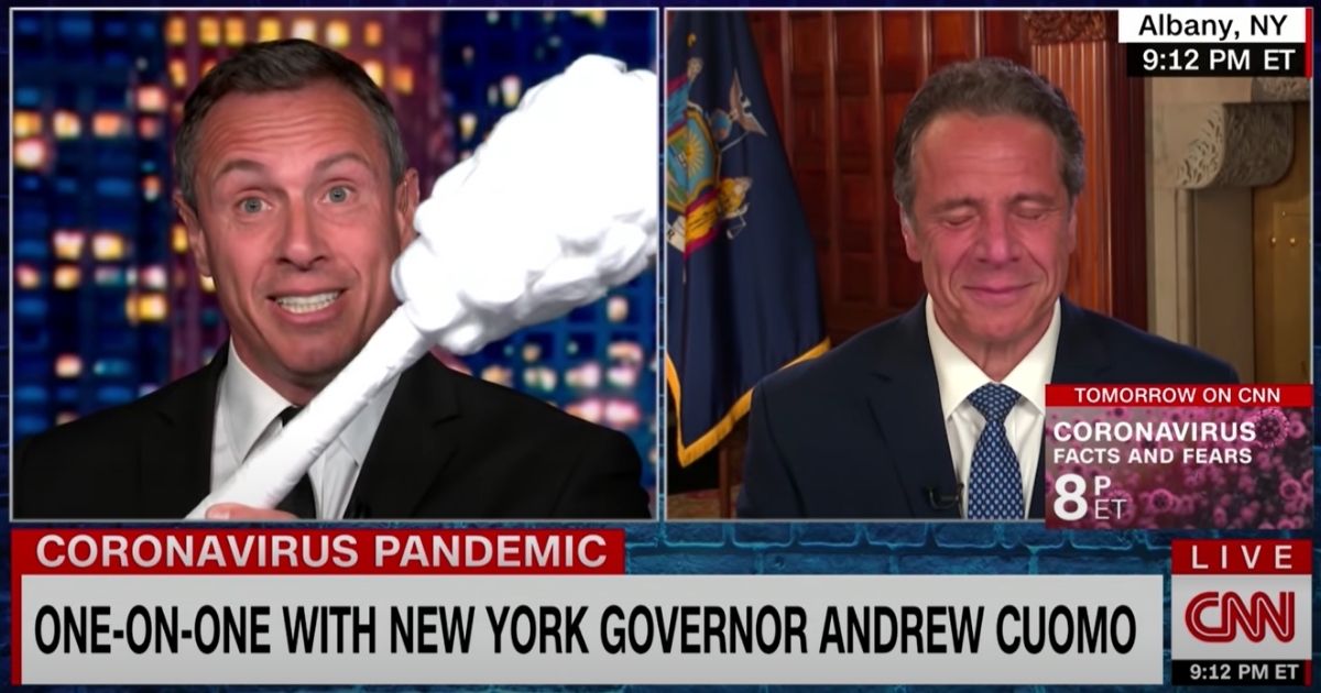 CNN's Chris Cuomo, left, jokes with his brother, New York Gov. Andrew Cuomo, on the air.