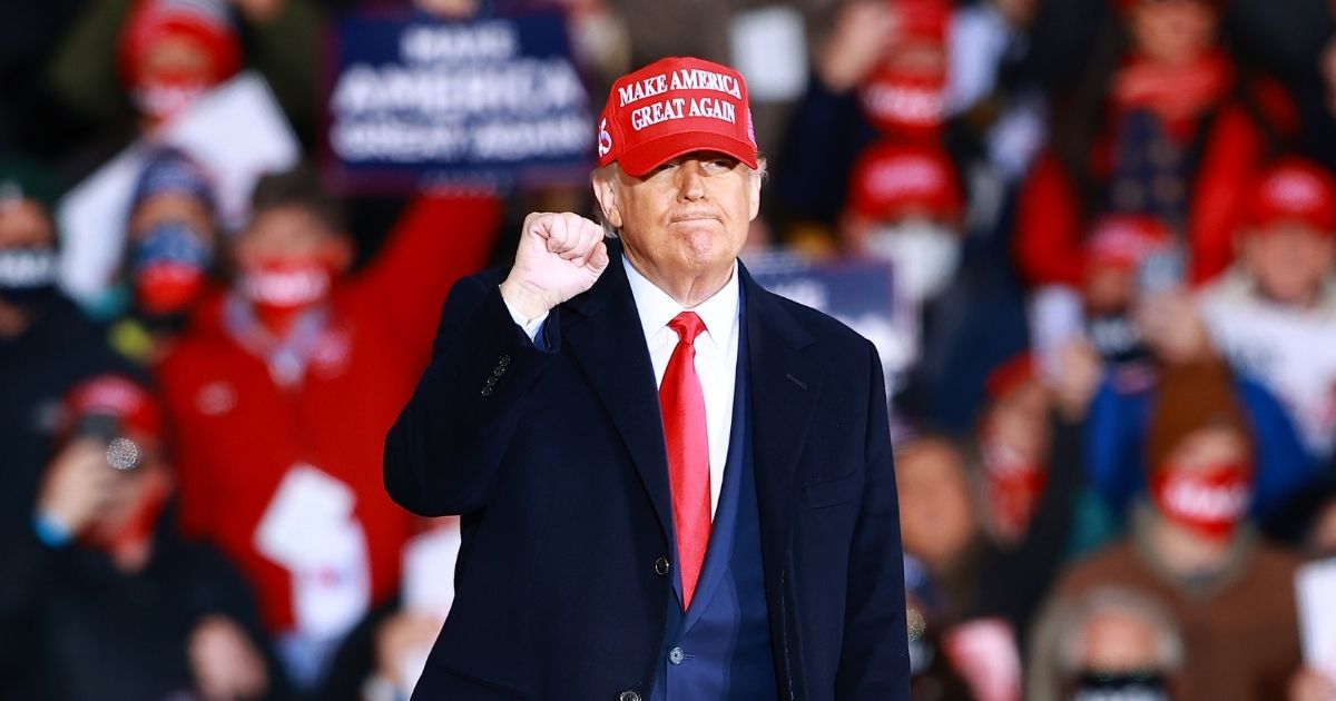 President Donald Trump gestures during a campaign rally on Oct. 17, 2020, in Muskegon, Michigan.