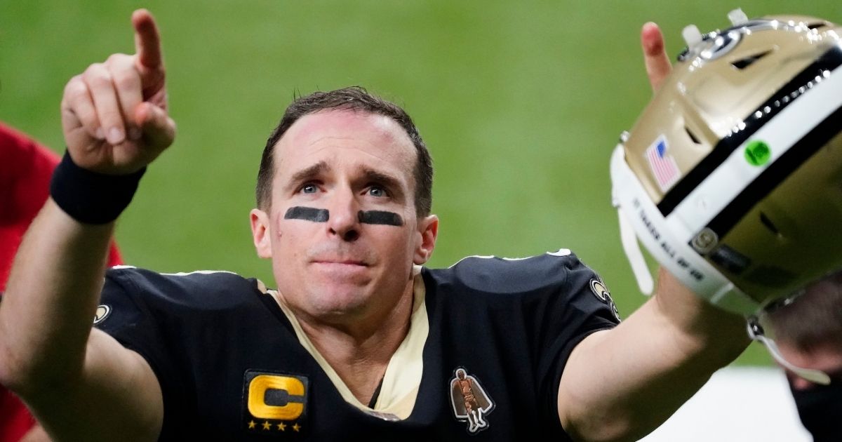 New Orleans Saints quarterback Drew Brees gestures to his family and fans after what turned out to be his last NFL game, a playoff loss to the Tampa Bay Buccaneers at the Mercedes-Benz Superdome on Jan. 17.