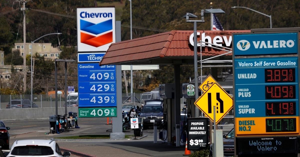 Gas prices over $4 a gallon are displayed at gas stations in Mill Valley, California, on March 3.