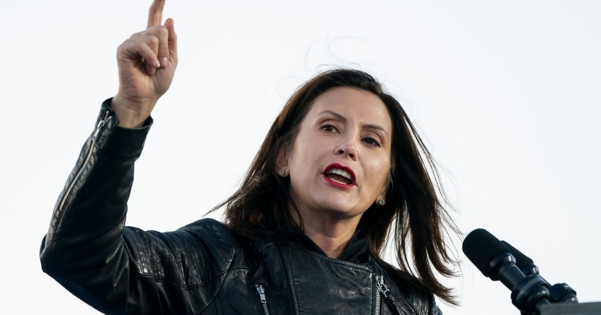 Gov. Gretchen Whitmer speaks during a drive-in campaign rally with Democratic presidential nominee Joe Biden and former President Barack Obama at Belle Isle on Oct. 31, 2020, in Detroit, Michigan.