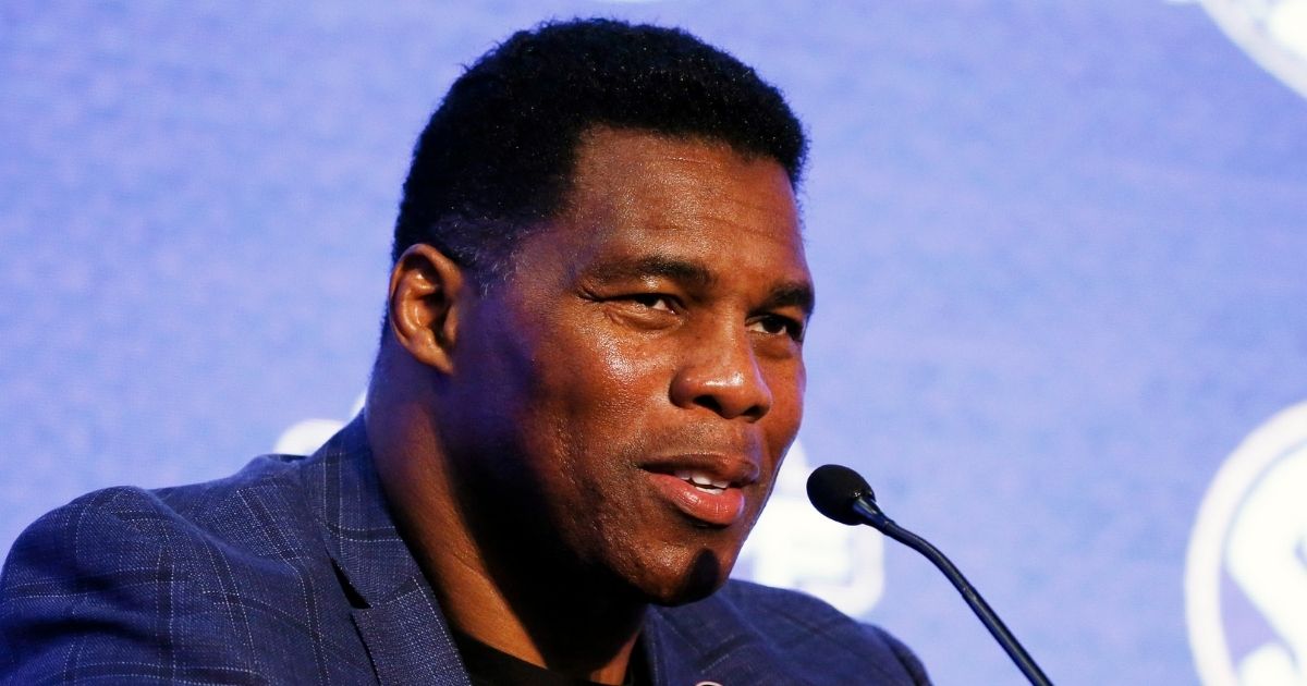 Herschel Walker talks about 150 years of college football during the NCAA college football Southeastern Conference Media Days on July 16, 2019, in Hoover, Alabama.