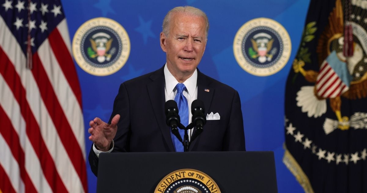 President Joe Biden speaks during an event with the CEOs of Johnson & Johnson and Merck at the South Court Auditorium of the Eisenhower Executive Office Building in Washington, D.C., on Thursday.