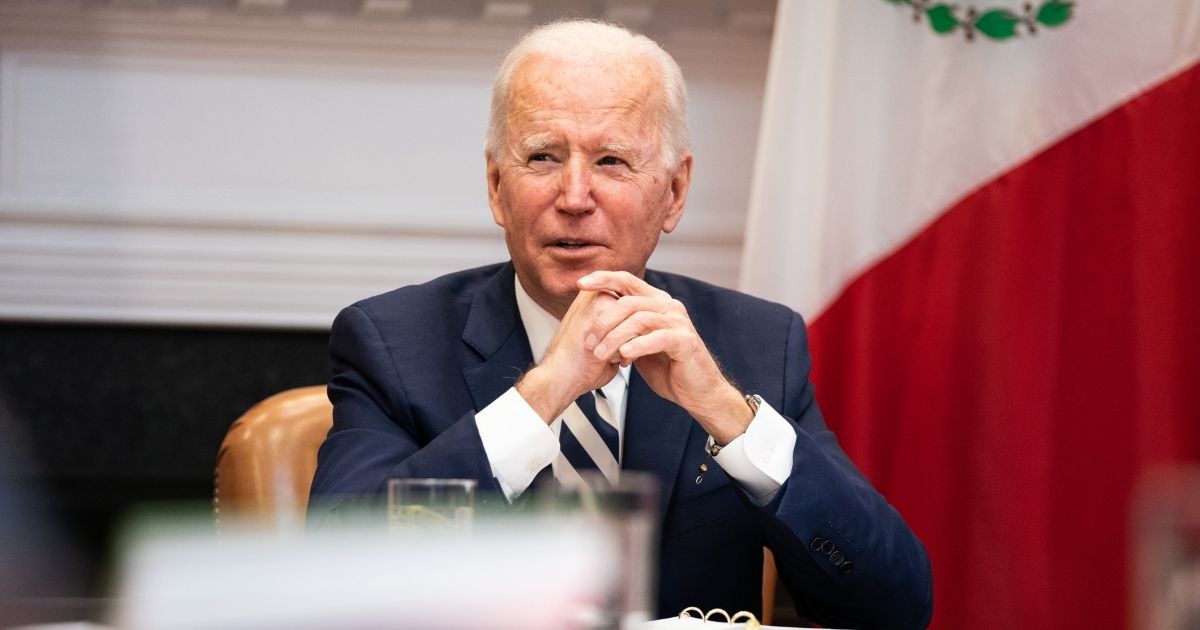 U.S. President Joe Biden attends a virtual meeting with Mexican President Andrés Manuel López Obrador in the Roosevelt Room of the White House in Washington, D.C., on Monday.