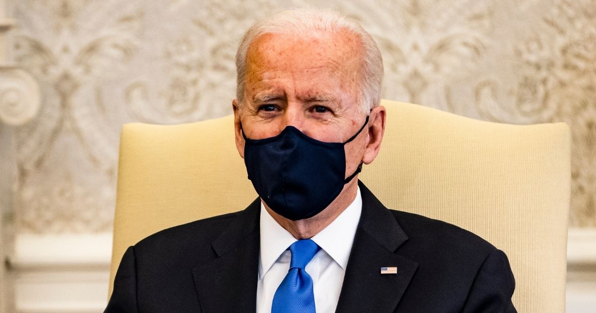 President Joe Biden holds a meeting on cancer with Vice President Kamala Harris and other lawmakers in the Oval Office at the White House on March 3, 2021, in Washington, D.C.